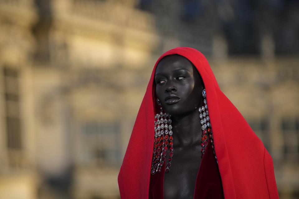 A model wears a creation for the Valentino Haute Couture Fall/winter 2023-2024 fashion collection presented in Chantilly, north of Paris, Wednesday, July 5, 2023. (AP Photo/Christophe Ena)