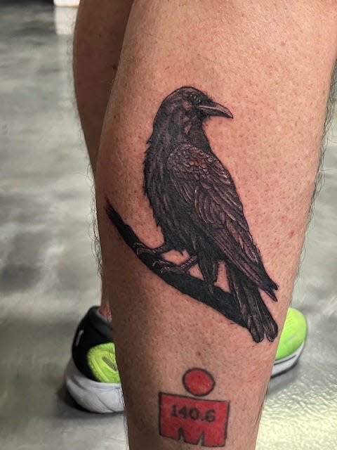 Michael Murawski's "Raven" tattoo proudly displayed on his leg. The Naples resident has 18 tattoos.