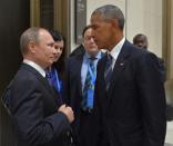 Russian President Vladimir Putin (L) meets with U.S. President Barack Obama on the sidelines. Sputnik/Kremlin/Alexei Druzhinin/via REUTERS