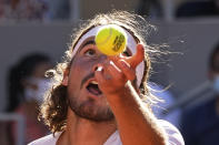 Stefanos Tsitsipas of Greece serves the ball to Serbia's Novak Djokovic during their final match of the French Open tennis tournament at the Roland Garros stadium Sunday, June 13, 2021 in Paris. (AP Photo/Michel Euler)
