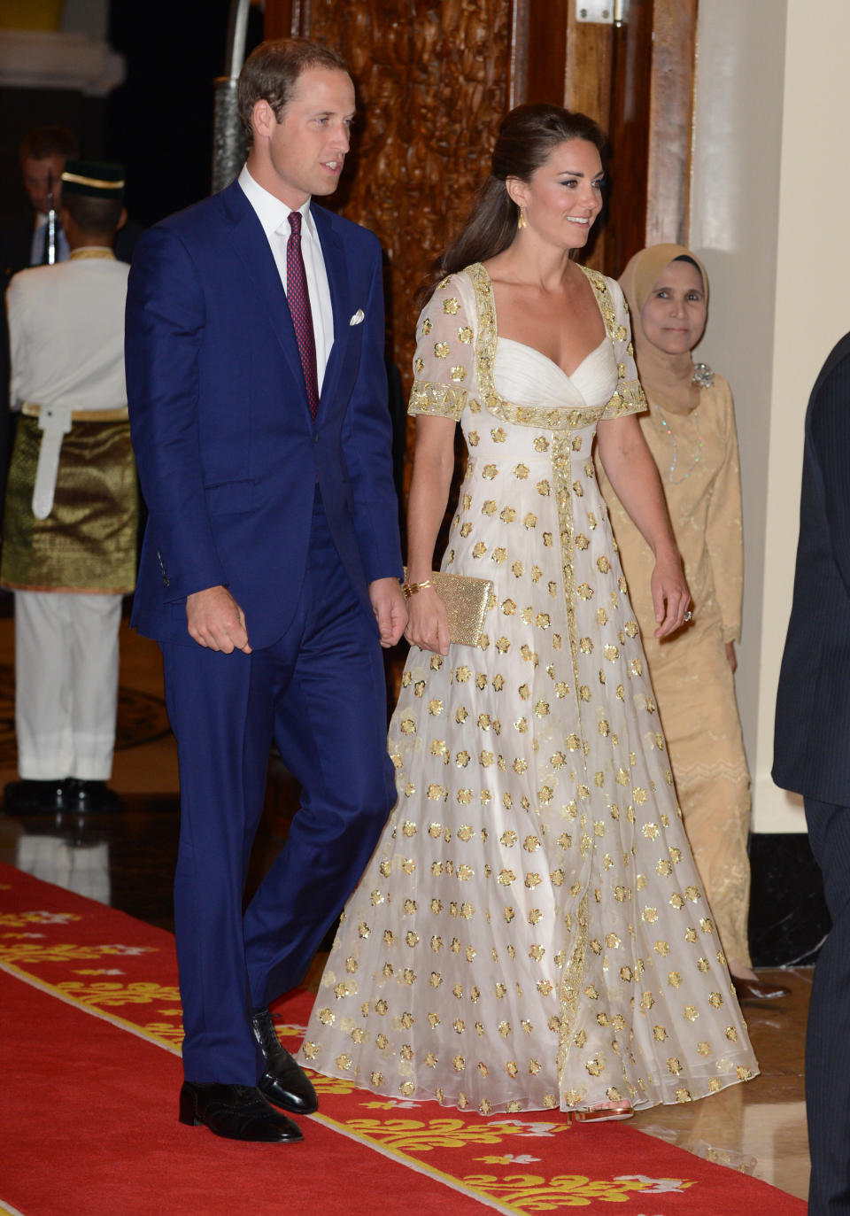 The couple attends an official dinner hosted by Malaysia's Head of State Sultan Abdul Halim Mu'adzam Shah of Kedah during their Diamond Jubilee Tour of South East Asia at the Istana Negara on Sept. 13 in Kuala Lumpur.