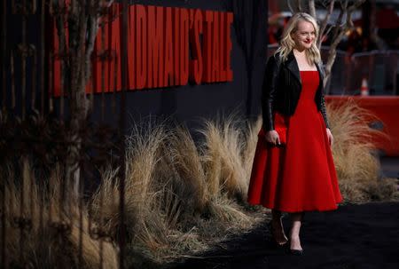 Cast member Elisabeth Moss poses at the premiere for the second season of the television series "The Handmaid's Tale" in Los Angeles, California, U.S., April19, 2018. REUTERS/Mario Anzuoni/Files