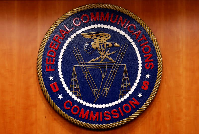 FILE PHOTO: The Federal Communications Commission (FCC) logo is seen before the FCC Net Neutrality hearing in Washington