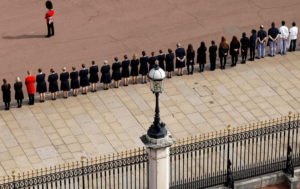 Buckingham Palace household staff line up to pay their respects (POOL/AFP via Getty Images)