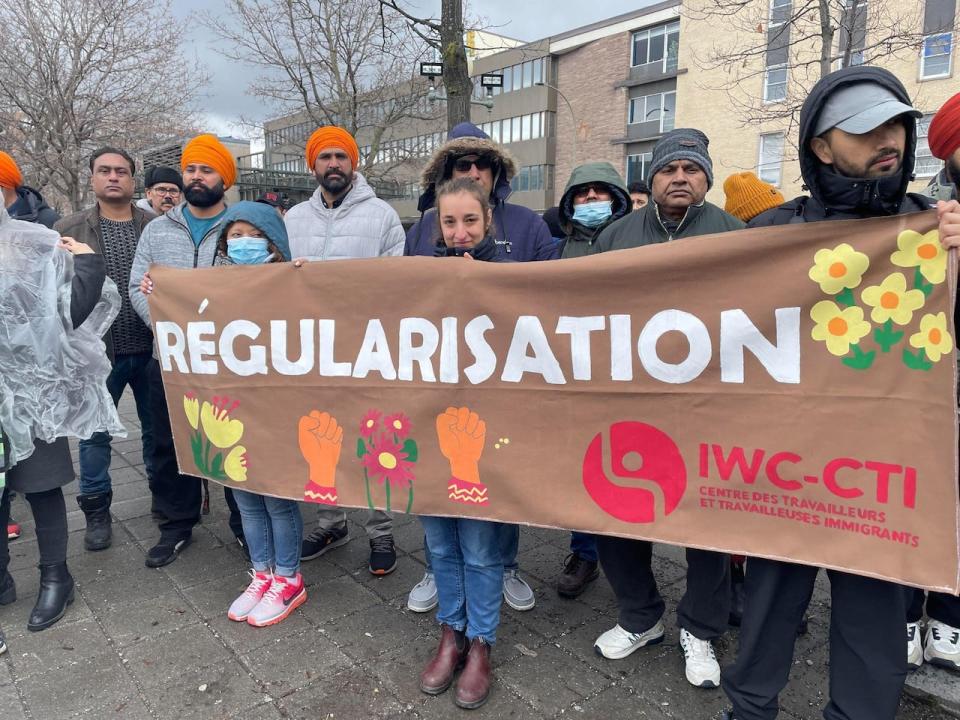 Protesters want the federal government to regularize the status of migrants, end deportations and immigration detention.   (Sharon Yonan-Renold/CBC - image credit)
