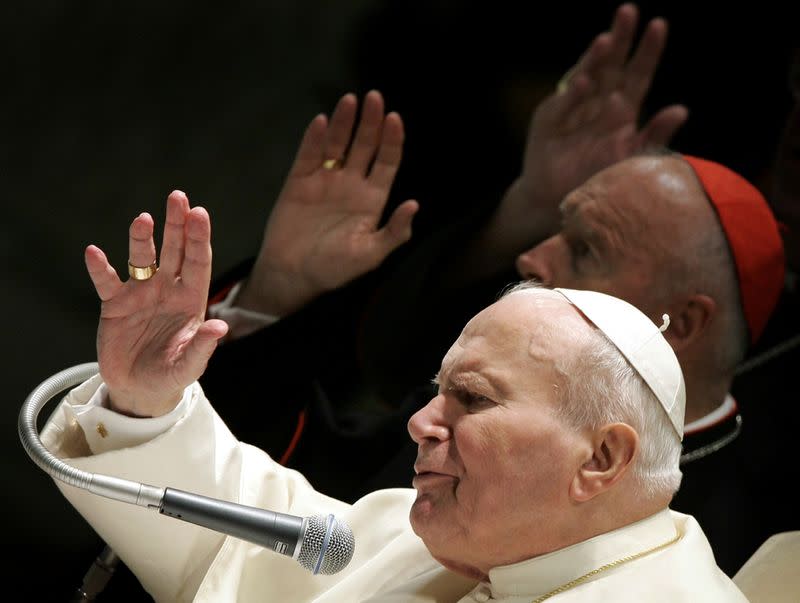 FILE PHOTO: Pope John Paul II and Archbishop of Washington Cardinal McCarrick give their blessing at end ...