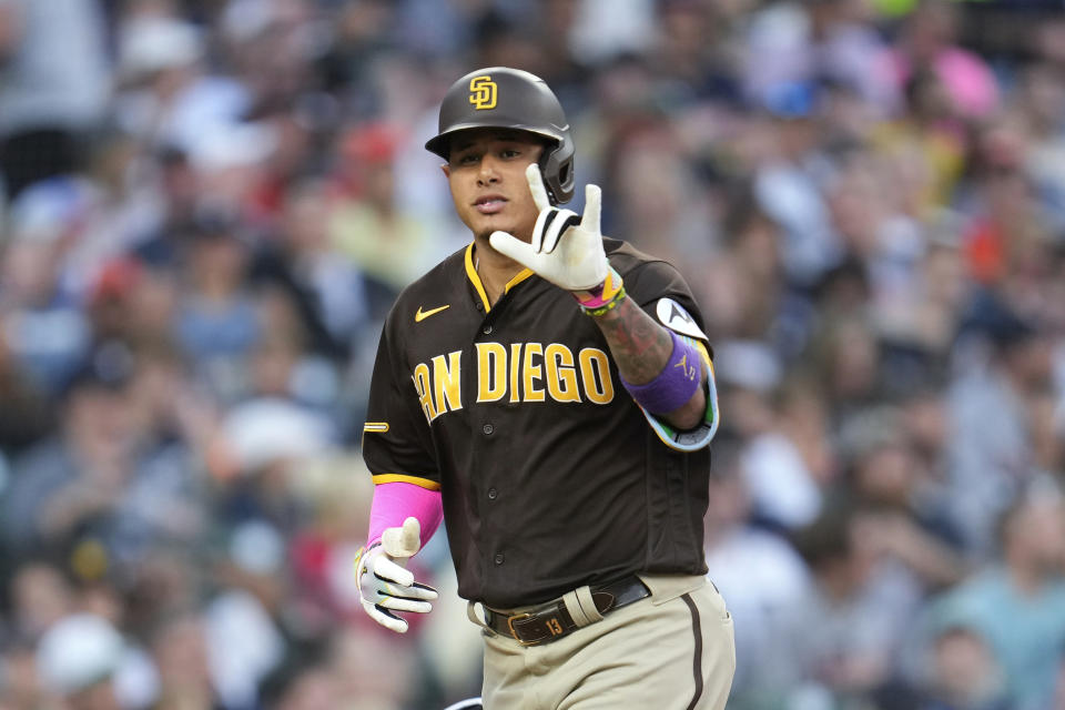 San Diego Padres' Manny Machado celebrates his three-run home run against the Detroit Tigers in the third inning of a baseball game, Saturday, July 22, 2023, in Detroit. (AP Photo/Paul Sancya)