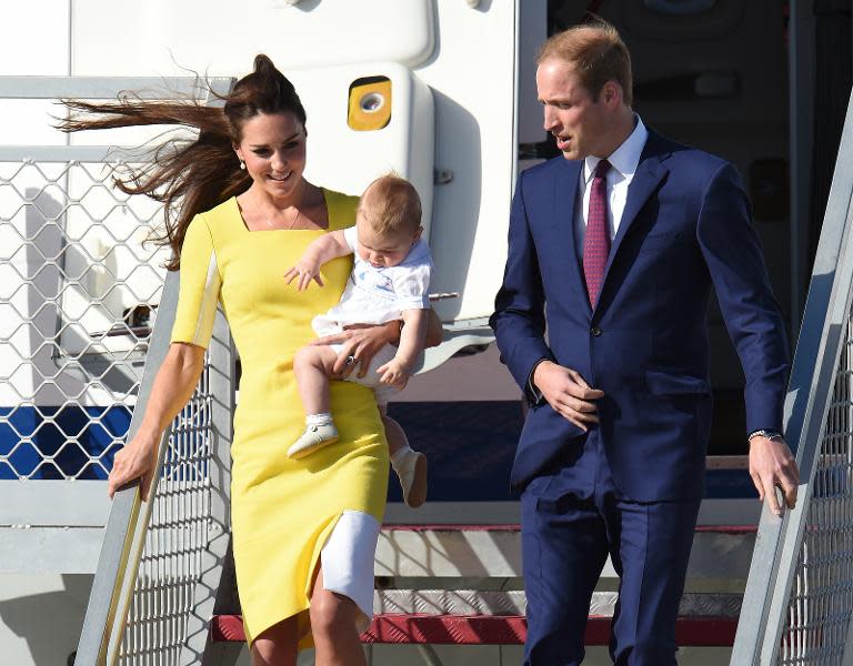 Prince William, his wife Catherine, the Duchess of Cambridge and their son Prince George arrive at Sydney airport on April 16, 2014