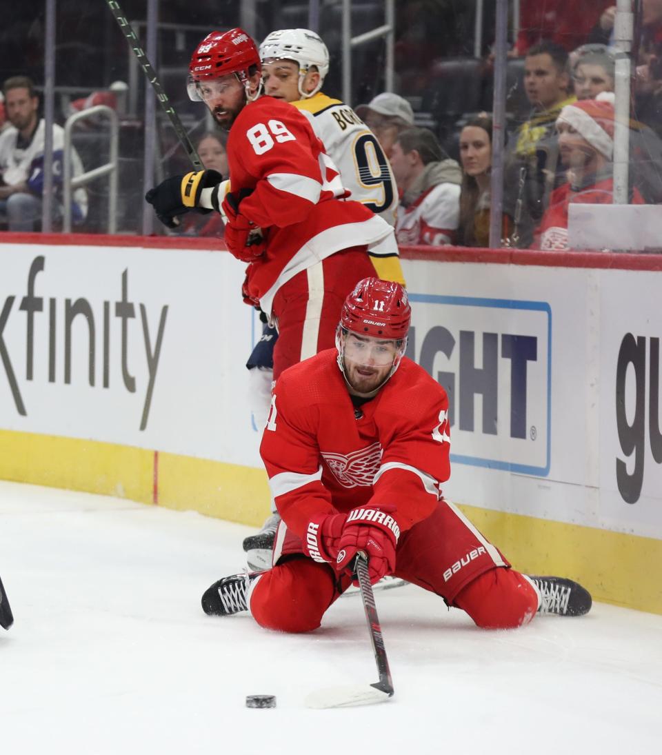 Detroit Red Wings right wing Filip Zadina (11) passes the puck against the Nashville Predators during first period action Tuesday, December 7, 2021, at Little Caesars Arena. 
