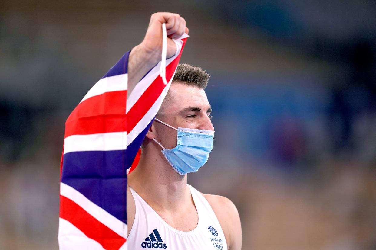 Great Britain’s Max Whitlock celebrates after winning the gold medal in the men’s pommel horse (Mike Egerton/PA) (PA Wire)