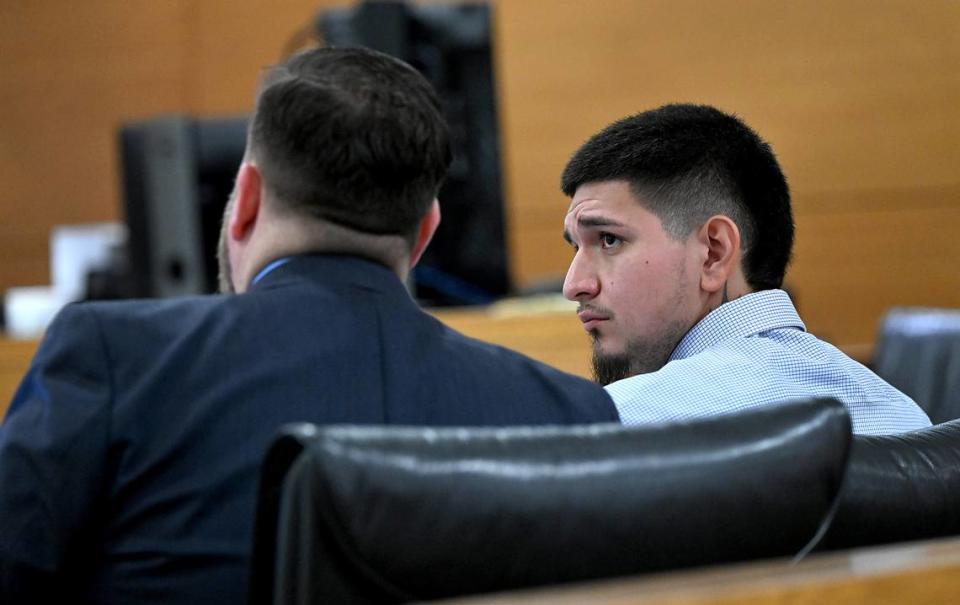 David Consuegra Jr. looks to his attorney, Eric Reisinger as he is the defendant in a joint trial with Jacob Maldonado presided over by Judge Frederick Mercurio at the Manatee County Judicial Center for a 2020 fatal shooting.
