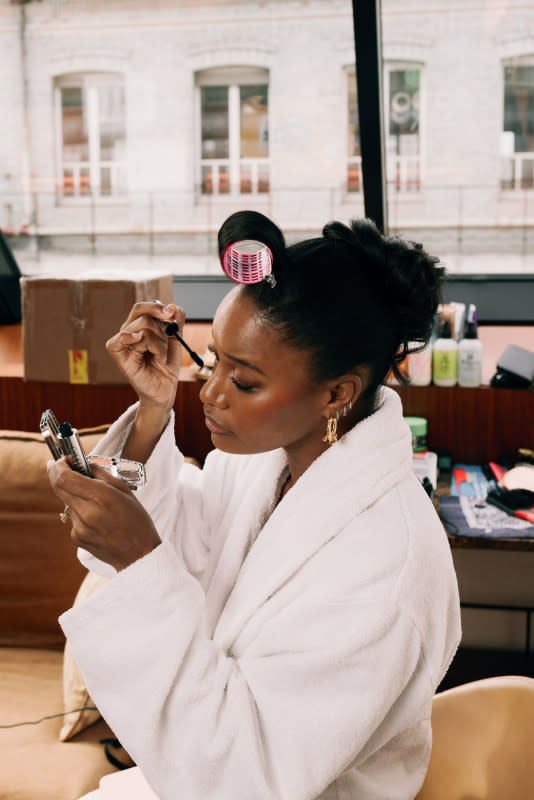 <em>Taylour Paige getting ready for the Rabanne Spring 2024 show.</em><p>Photo: Guel Sener/Courtesy of Rabanne Beauty</p>