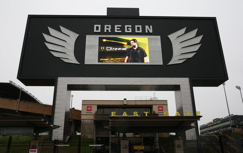 A picture of new Oregon football coach Dan Lanning graces the backside of the video screen at Autzen Stadium Monday Dec. 13, 2021 in Eugene, Oregon.