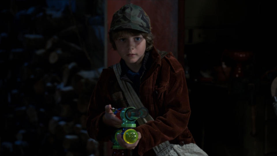 Ty Simpkins holds a potato gun in defense in Iron Man 3.