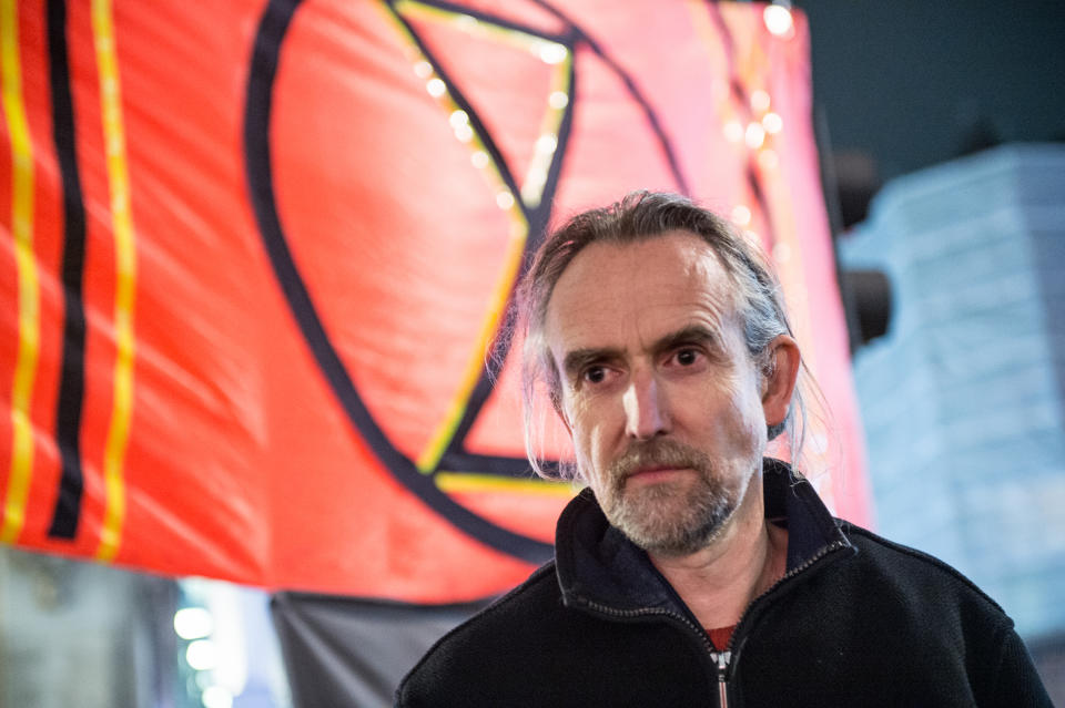 LONDON, ENGLAND - APRIL 16: Extinction Rebellion environmental activist organiser Roger Hallam seen after talking to the crowd of activists being placed under arrest and removed from their occupation of Oxford Circus by the Metropolitan Police on April 16, 2019 in London, England. The group, who have stopped all buses in the center of London until at least Wednesday aims to stop traffic and occupy key locations causing maximum disruption to the capital for up to two weeks unless their climate protection demands are met by Government as a series of their protests are taking place globally. (Photo by Ollie Millington/Getty Images)