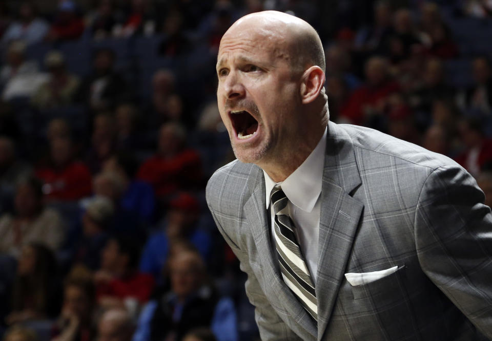 Mississippi head coach Andy Kennedy calls out instructions to his players during the first half of an NCAA college basketball game against Auburn in Oxford, Miss., Tuesday, Jan. 30, 2018. Auburn won 79-70. (AP Photo/Rogelio V. Solis)