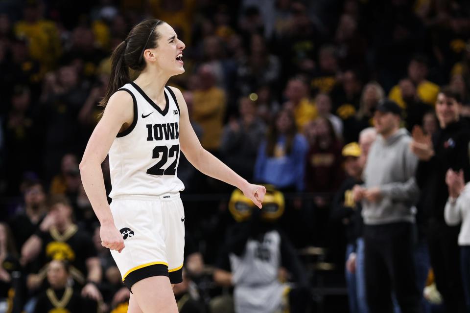 Iowa Hawkeyes guard Caitlin Clark (22) celebrates during the second half against the Ohio State Buckeyes at Target Center in Minneapolis on March 5, 2023.
