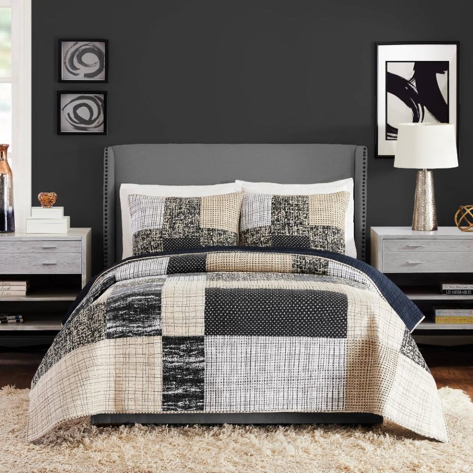 <p><a href="https://go.redirectingat.com?id=74968X1596630&url=https%3A%2F%2Fwww.target.com%2Fp%2F3pc-king-tate-quilt-38-sham-set-black-gray-cream-ayesha-curry%2F-%2FA-84235446&sref=https%3A%2F%2Fwww.cosmopolitan.com%2Flifestyle%2Fg46351411%2Fbest-quilts-and-coverlets-review%2F" rel="nofollow noopener" target="_blank" data-ylk="slk:Shop Now;elm:context_link;itc:0;sec:content-canvas" class="link ">Shop Now</a></p><p>Patch Print Quilt & Sham Set </p><p>target.com</p><p>$99.99</p>