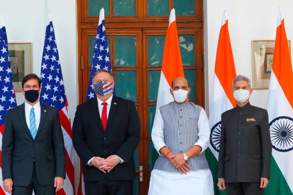 US Secretary of State Mike Pompeo (2nd L), US Secretary of Defence Mark Esper (L), India's Defence Minister Rajnath Singh (2nd R) and India's Foreign Minister Subrahmanyam Jaishankar pose for pictures before their meeting at Hyderabad House in New Delhi on October 27, 2020.