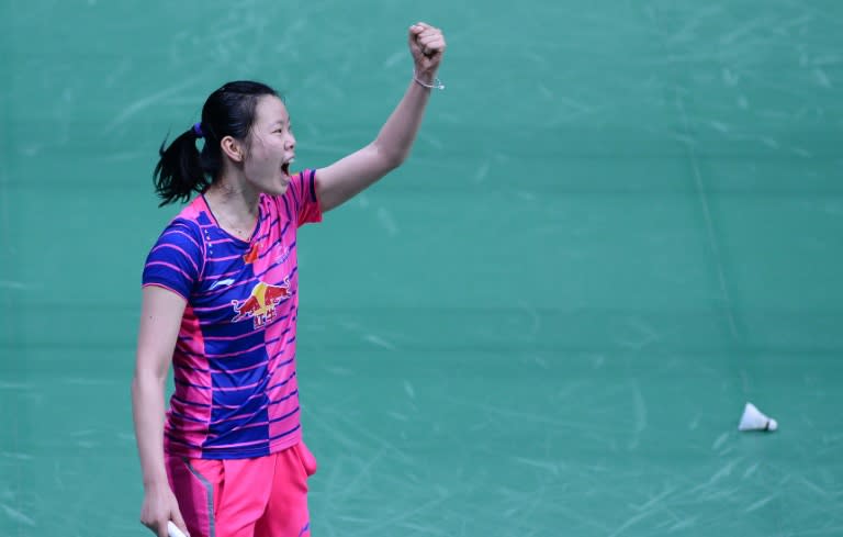 China's Li Xuerui celebrates victory over the defending champion and home favourite Saina Nehwal at the India Open in New Delhi on April 2, 2016