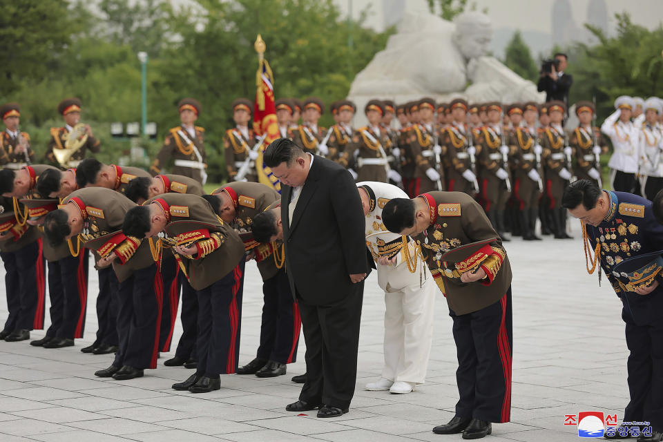 In this photo provided by the North Korean government, North Korean leader Kim Jong Un, second right in front, visits a liberation war martyrs cemetery in Pyongyang, North Korea Tuesday, July 25, 2023, on the occasion of the 70th anniversary of the armistice that halted fighting in the 1950-53 Korean War. Independent journalists were not given access to cover the event depicted in this image distributed by the North Korean government. The content of this image is as provided and cannot be independently verified. Korean language watermark on image as provided by source reads: "KCNA" which is the abbreviation for Korean Central News Agency. (Korean Central News Agency/Korea News Service via AP)