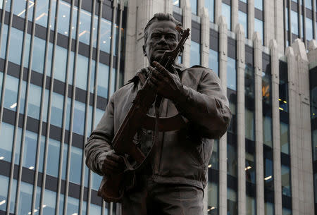 A monument to Mikhail Kalashnikov, the Russian designer of the AK-47 assault rifle, is seen during its opening ceremony in Moscow, Russia September 19, 2017. REUTERS/Sergei Karpukhin