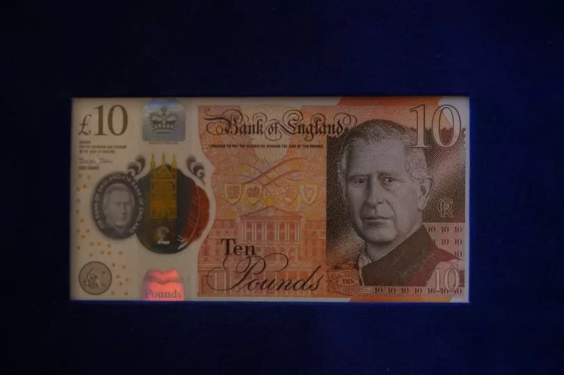 A new £10 banknote bearing a portrait of King Charles III, which will enter circulation on June 5, with his face also visible in cameo in the see-through security window