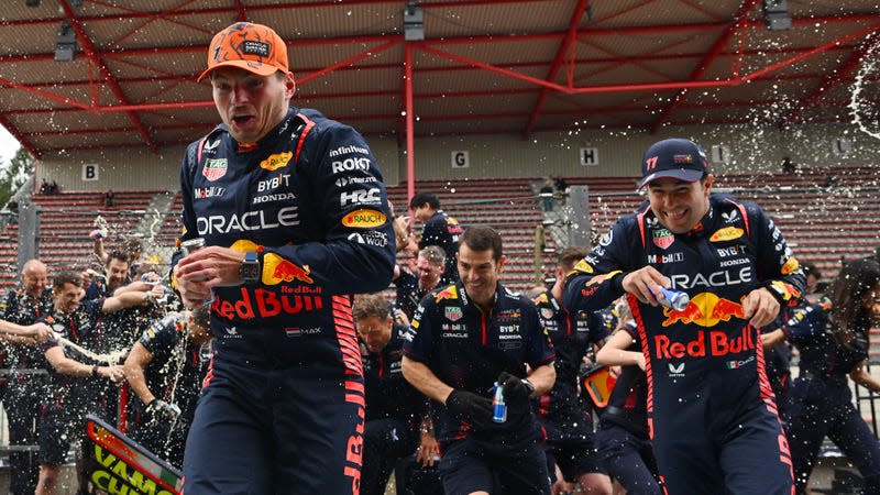 Race winner Max Verstappen of the Netherlands and Oracle Red Bull Racing, Second placed Sergio Perez of Mexico and Oracle Red Bull Racing and the Red Bull Racing team celebrate following the F1 Grand Prix of Belgium at Circuit de Spa-Francorchamps on July 30, 2023 in Spa, Belgium.