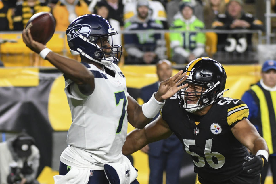 Pittsburgh Steelers outside linebacker Alex Highsmith (56) pressures Seattle Seahawks quarterback Geno Smith (7) in the first half of an NFL football game, Sunday, Oct. 17, 2021, in Pittsburgh. (AP Photo/Fred Vuich)