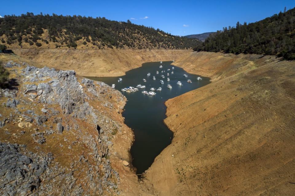 <div class="inline-image__caption"><p>Houseboats whose owners chose to leave them in the lake, float at a water level nearly 200 feet below normal at the Lime Saddle Marina for Lake Oroville near Paradise, Calif., on Tuesday, June 8, 2021. </p></div> <div class="inline-image__credit">San Francisco Chronicle/Hearst Newspapers via Getty</div>