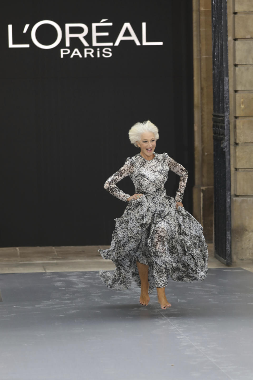 Actress Dame Helen Mirren wears a creation as part of the L'Oreal Ready To Wear Spring-Summer 2020 collection, unveiled during the fashion week, in Paris, Saturday, Sept. 28, 2019. (Photo by Vianney Le Caer/Invision/AP)