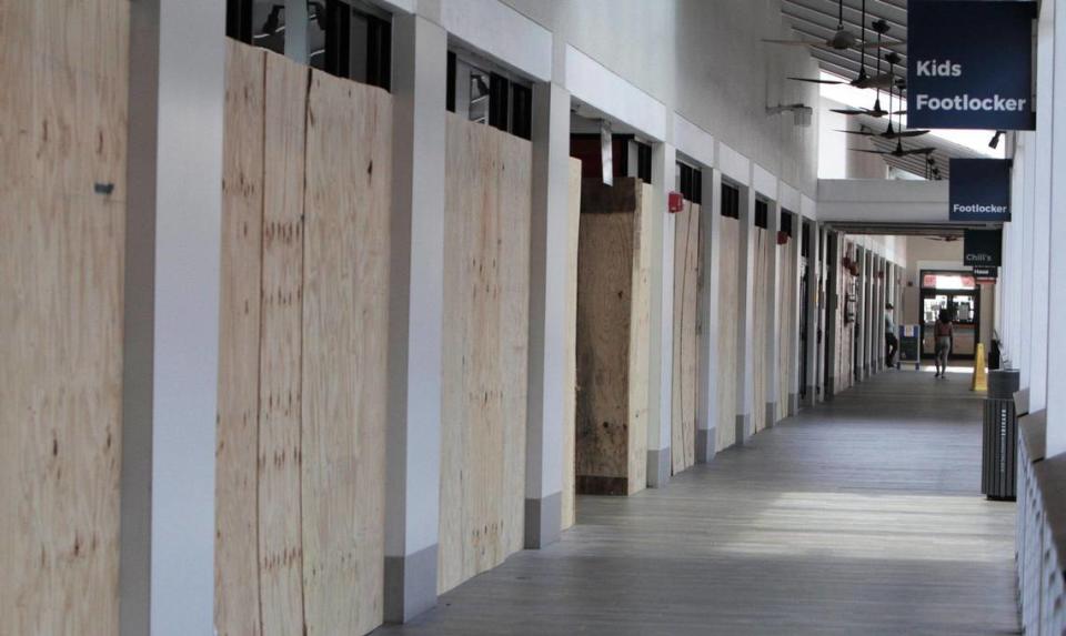 Miami, Florida, June 10, 2020- Kids Footlocker and Footlocker stores are boarded up after looting took place during the George Floyd protests in downtown Miami. Bayside was in the midst of a $27 million renovation to help its image stay with the times, but in mid-March, county and state officials shut down all nonessential businesses due to the Coronavirus pandemic. Bayside was also the target of looting amid the George Floyd protests; at least five stores, including Footlocker and Guess, saw property damage.