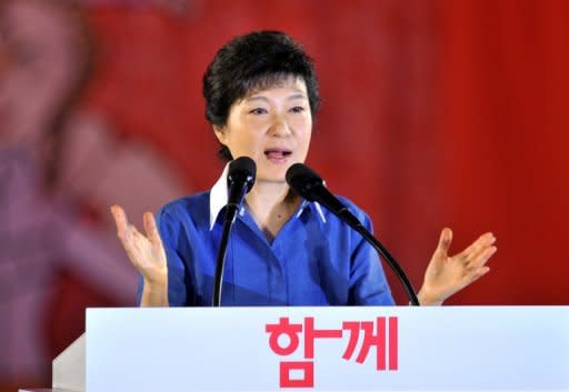 The ruling party candidate in South Korea's presidential election apologised Monday for human rights abuses during the repressive rule of her late father, military strongman Park Chung-Hee. Park Geun-Hye (pictured in August) offered her "sincere apologies to those who suffered and were wounded during this period, and to their families."