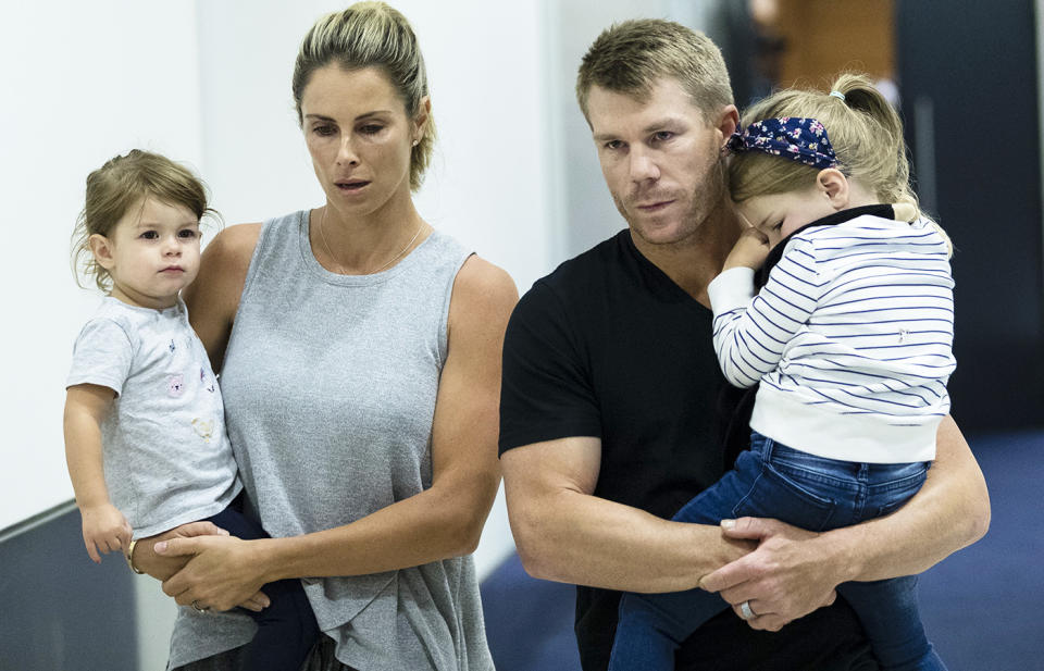 David Warner, pictured here wife Candice and their daughters after returning home from South Africa in 2018.