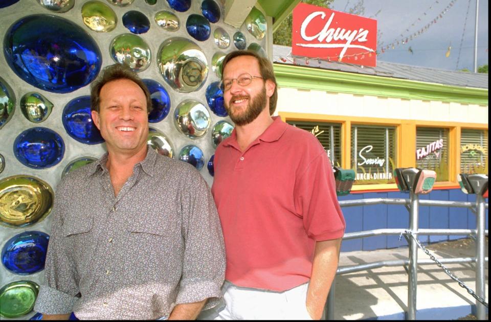 Mike Young, left, and John Zapp, seen in 1995, opened the original Chuy's on Barton Springs Road in 1982.