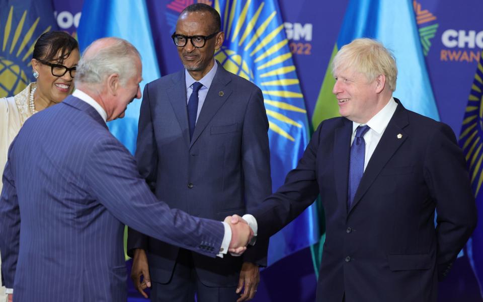Boris Johnson and the Prince of Wales shake hands at the Commonwealth Heads of Government Meeting, before their private talk - Chris Jackson/PA Wire