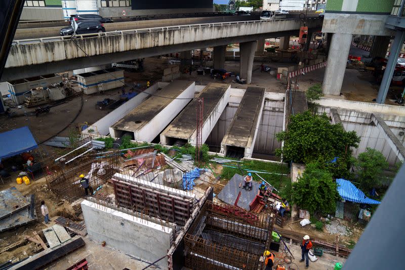 A construction site and a bridge are seen in the place of the Constitution Defense Monument in Bangkok