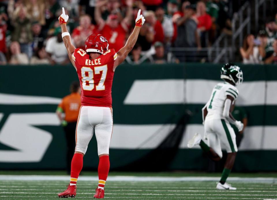 Chiefs tight end Travis Kelce (87) celebrates a teammate Noah Gray's touchdown during the first quarter on Sunday night.