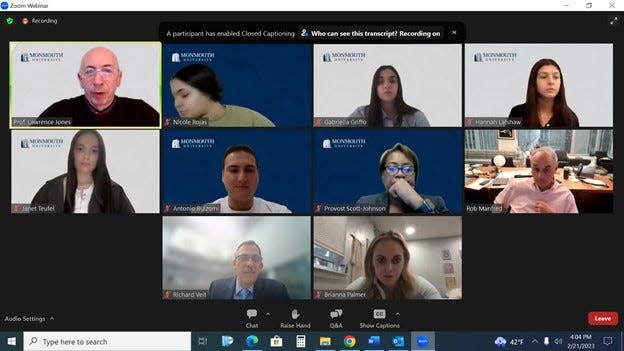 Major League Baseball commissioner Rob Manfred (right, middle) speaks with Monmouth University students on a Zoom.