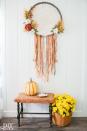 <p>This dreamy, oversized dreamcatcher works beautifully as an wreath when it's hung in the center of your front door. Keep things grounded with earthy faux flowers. </p><p><strong>Get the tutorial at <a href="https://diyshowoff.com/2017/09/11/diy-fall-dreamcatcher-door-wreath-decor-tutorial/" rel="nofollow noopener" target="_blank" data-ylk="slk:DIY Show Off;elm:context_link;itc:0;sec:content-canvas" class="link ">DIY Show Off</a>.</strong></p><p><strong><a class="link " href="https://www.amazon.com/Best-Sellers-Home-Kitchen-Artificial-Flowers/zgbs/home-garden/14087331?tag=syn-yahoo-20&ascsubtag=%5Bartid%7C10050.g.2063%5Bsrc%7Cyahoo-us" rel="nofollow noopener" target="_blank" data-ylk="slk:SHOP ARTIFICIAL FLOWERS;elm:context_link;itc:0;sec:content-canvas">SHOP ARTIFICIAL FLOWERS</a></strong></p>