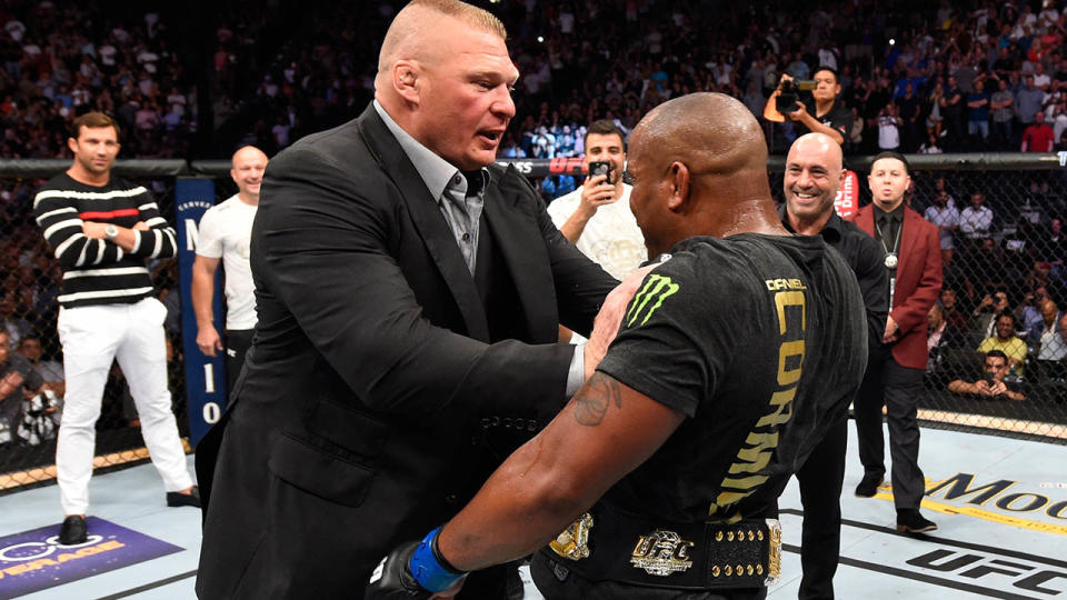 Brock Lesnar confronts Daniel Cormier after his UFC heavyweight championship fight at UFC 226. (Photo by Josh Hedges/Zuffa LLC/Zuffa LLC via Getty Images)