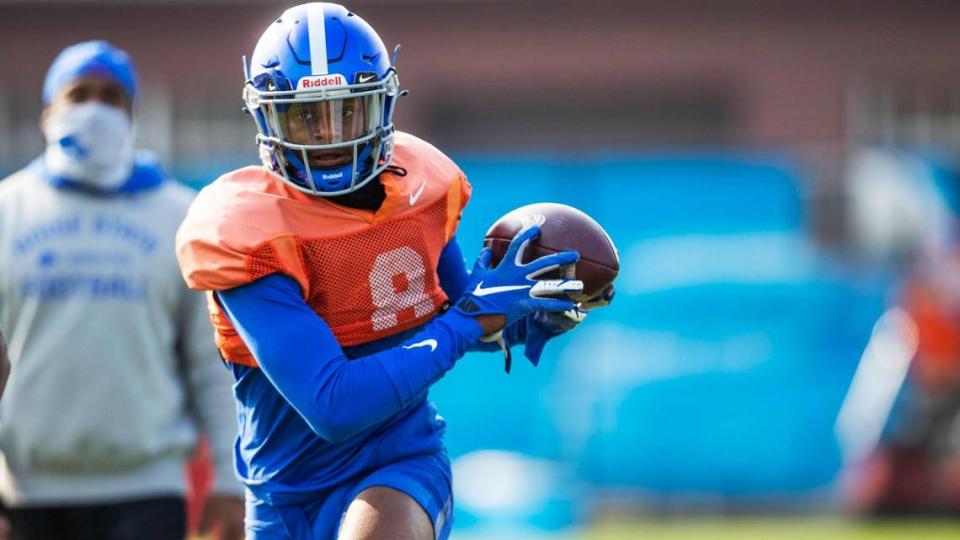 Boise State cornerback Markel Reed attacks the ball during fall camp drills Wednesday, Aug. 18, 2021.