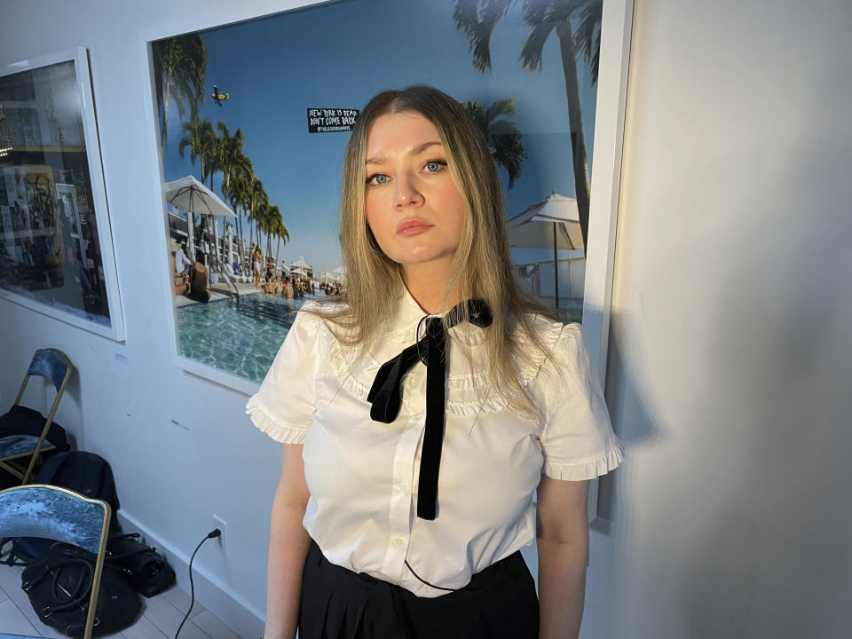 Anna Delvey, also known as Anna Sorokin, poses at her apartment in New York on May 26, 2023, to promote her podcast, “The Anna Delvey Show.” (AP Photo/John Carucci)