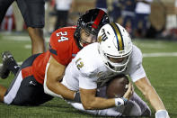 Texas Tech's Jacob Morgenstern (24) sacks Florida International's Max Bortenschlager (12) during the second half of an NCAA college football game on Saturday, Sept. 18, 2021, in Lubbock, Texas. (AP Photo/Brad Tollefson)