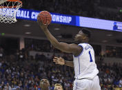 Duke's s Zion Williamson (1) drives to the basket against North Dakota State in a first-round game in the NCAA men’s college basketball tournament in Columbia, S.C., Friday, March 22, 2019. (AP Photo/Richard Shiro)