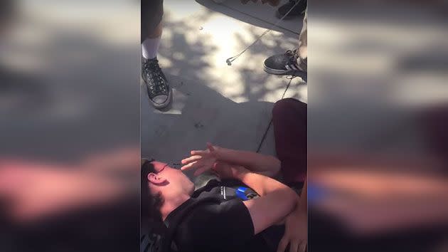 The bully was left stunned and bloodied after picking a fight with a blind student. Photo: YouTube