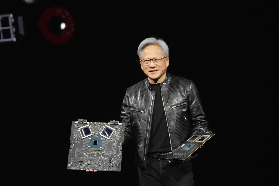 CEO Jensen Huang talks about processing units during the Nvidia GTC keynote address in San Jose, California, Monday, March 18, 2024. (AP Photo/Eric Risberg)