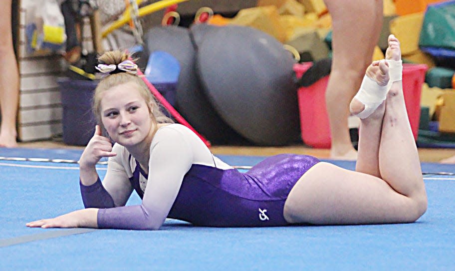 Watertown's Ashlynn Andrews poses during her floor-exercise routine in a high school gymnastics triangular on Thursday, Jan. 4, 2024 at Huron.