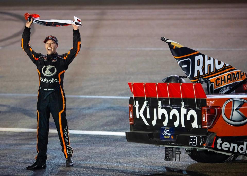 Nov 3, 2023; Avondale, Arizona, USA; NASCAR Truck Series driver Ben Rhodes celebrates after winning the Truck Series Championship during the Championship Race at Phoenix Raceway.