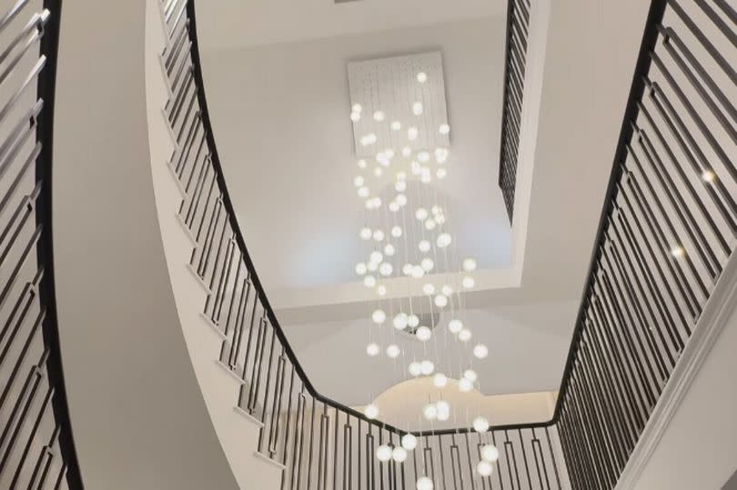 Mark and Michelle's hanging centrepiece chandelier at their home